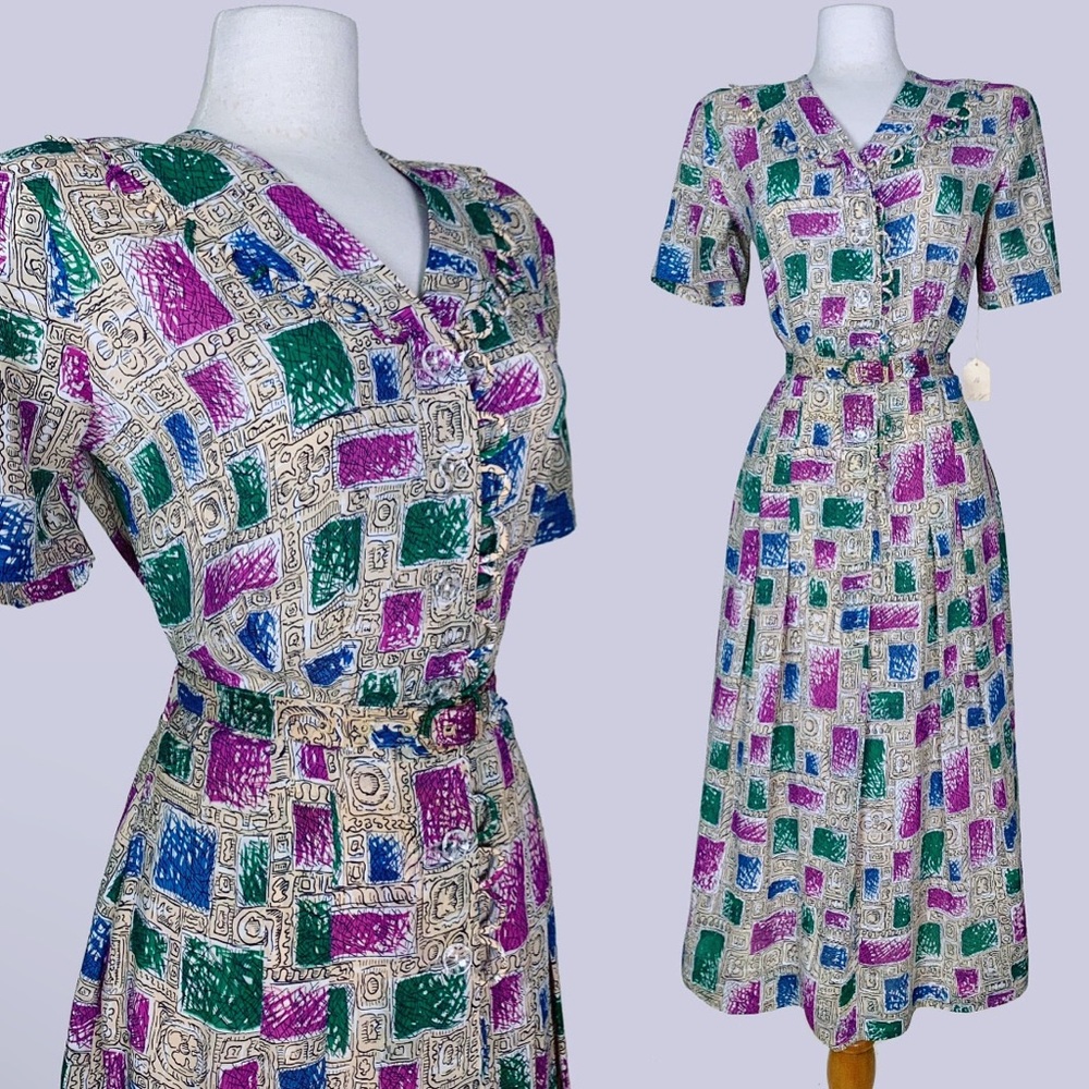 1940s vintage printed rayon dress made by Good saw it has its original tags.